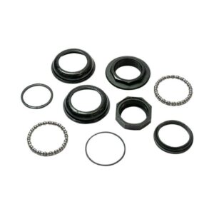 Svart Babboe City/Mini styrheadsetdel-set med kullagerringar, kopplingar, distanser och låsmuttrar mot en vit bakgrund.