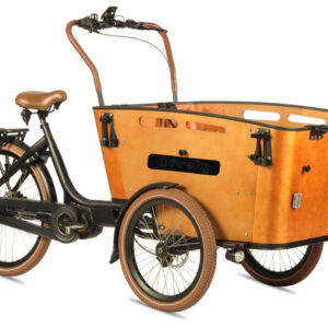 Qivelo Curve DR7 är en prisvärd trehjulig lådcykel med stor trälåda fram, svart ram, brunt säte och handtag samt ljusa däck - idealisk för att frakta varor eller passagerare.